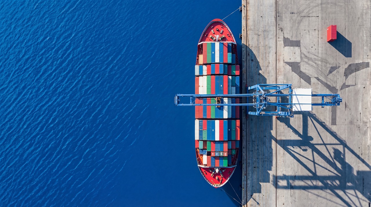 Aerial view of a port terminal and container ship